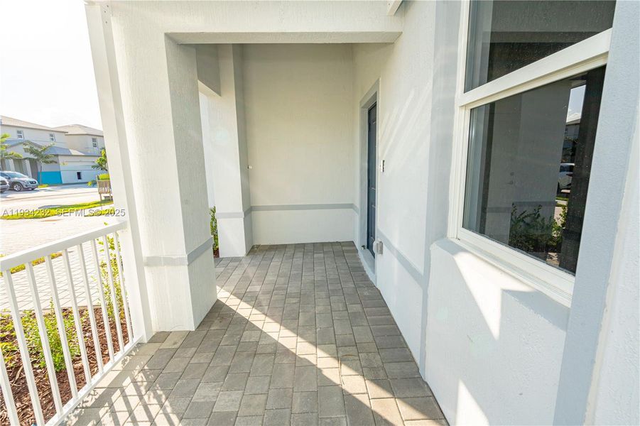 Exterior details and patio area of a home in Acacia Groves, Miami (Image 3).