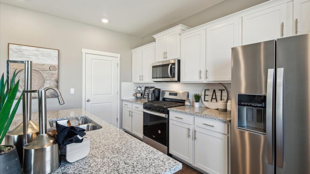 Furnished interior view inside a new home in Settlers Crossing, Commerce City (Image 11).