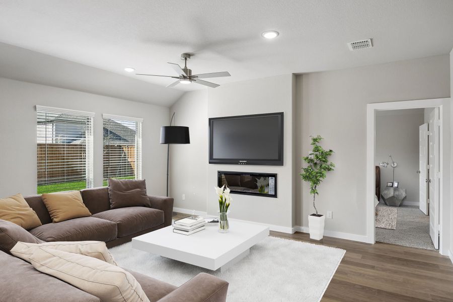 Living Room in the Emmy II home plan by Trophy Signature Homes - REPRESENTATIVE PHOTO