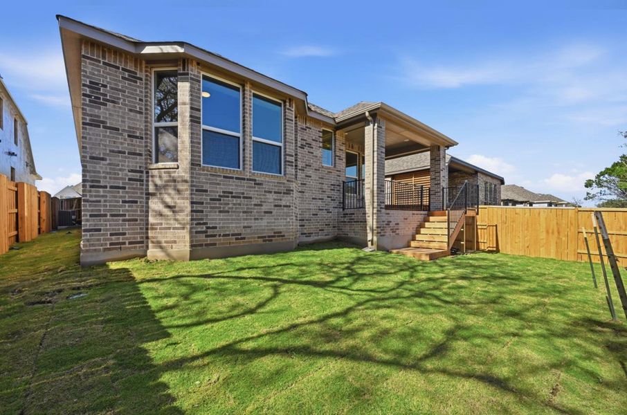 Exterior details and patio area of a home in 6 Creeks at Waterridge, Kyle (Image 15).