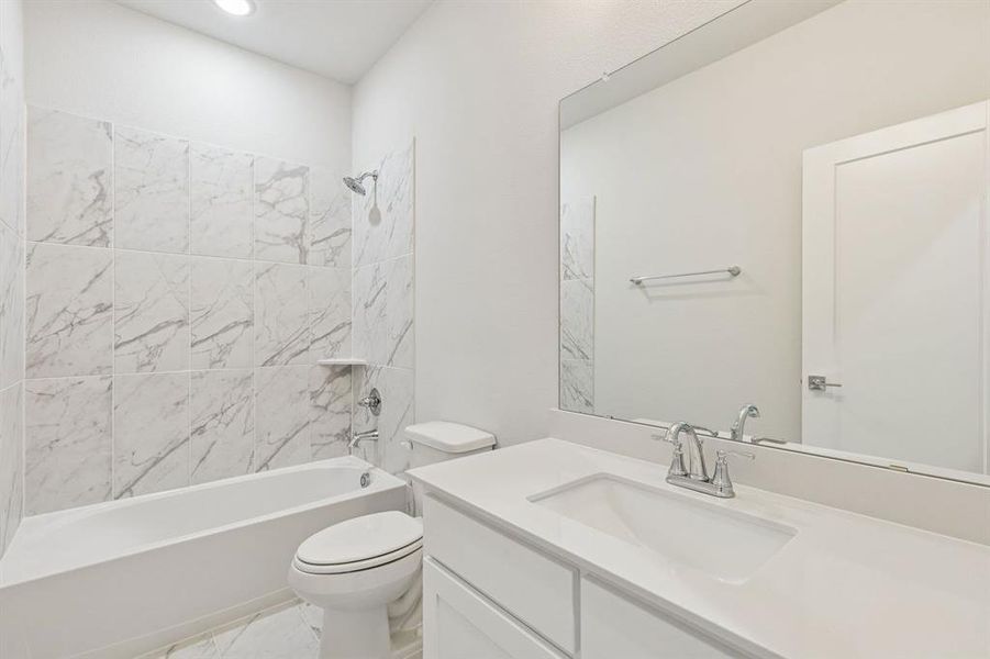 Bathroom in the Masters home plan by Trophy Signature Homes – REPRESENTATIVE PHOTO Bathroom in the Masters home plan by Trophy Signature Homes – REPRESENTATIVE PHOTO