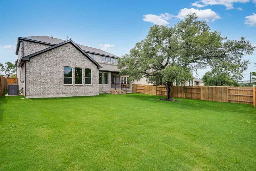 Representative exterior photo of a completed home built from the Peridot by Taylor Morrison in Santa Rita Ranch, Liberty Hill, TX (Image 18). Representative exterior photo of a completed home built from the Peridot by Taylor Morrison in Santa Rita Ranch, Liberty Hill, TX (Image 18).