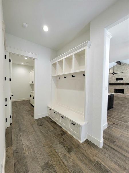 Mudroom with dark hardwood / wood-style flooring