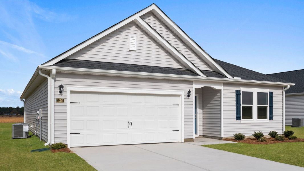 Front exterior of a new home in East Ridge, Ayden, NC, highlighting curb appeal (Image 17).