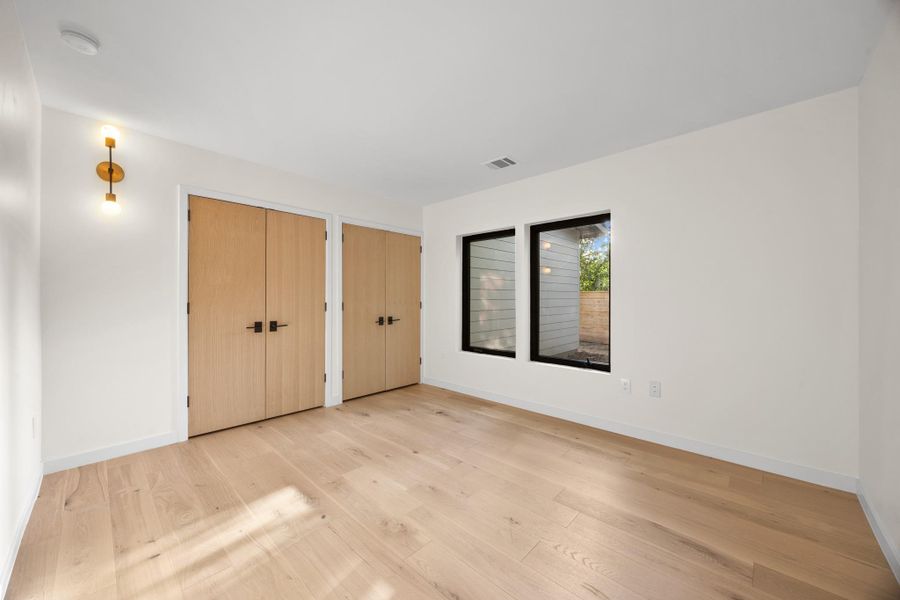 3rd bedroom with vinyl floor nd double closets 3rd bedroom with vinyl floor nd double closets