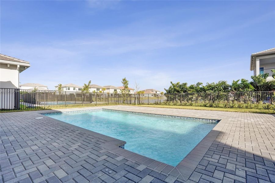 Exterior details and patio area of a home in Apex at Avenir, Palm Beach Gardens (Image 34).