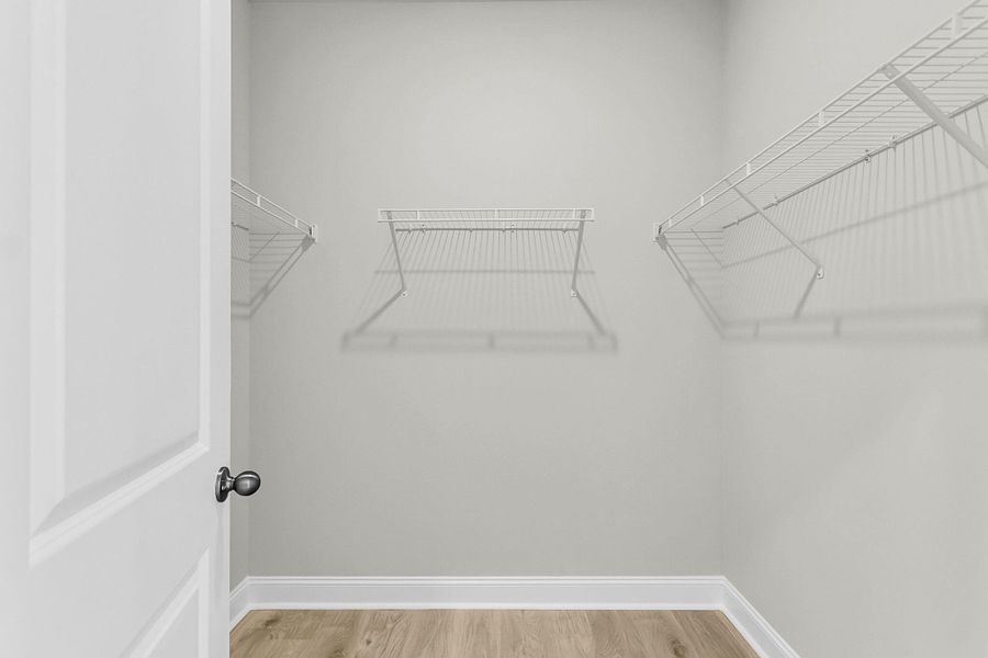 Spacious, unfurnished interior of a new home in Tidewater at Lakes of Cane Bay, Summerville (Image 59).