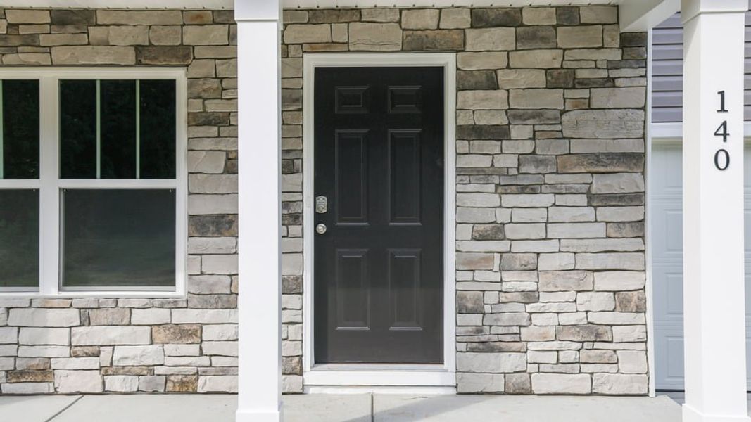 Exterior details and patio area of a home in Hawk Ridge, Anderson (Image 2). Exterior details and patio area of a home in Hawk Ridge, Anderson (Image 2).