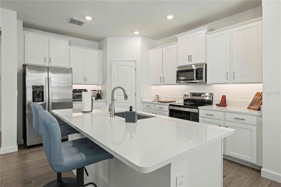 Furnished interior view inside a new home in Angeline Active Adult, Land O' Lakes (Image 13). Furnished interior view inside a new home in Angeline Active Adult, Land O' Lakes (Image 13).