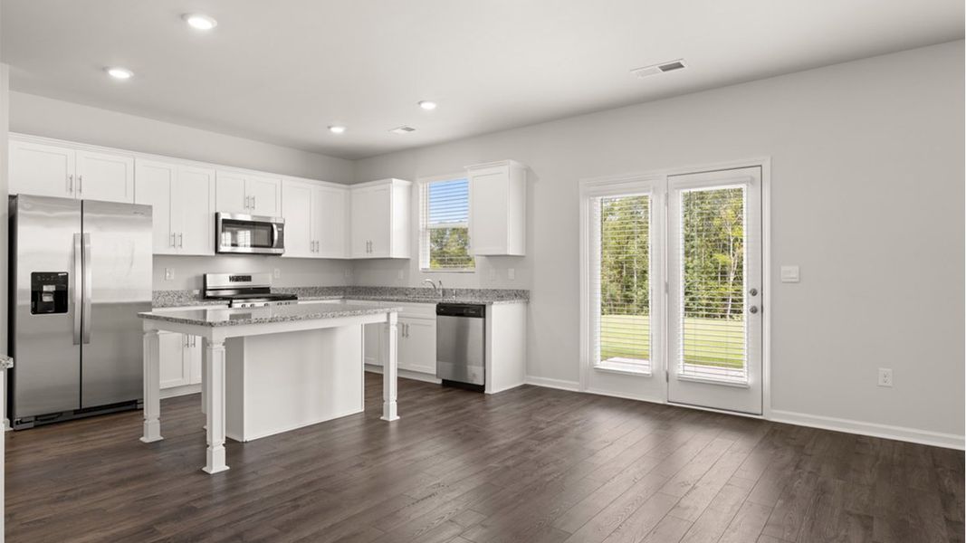 Representative furnished interior of a home built from the Mansfield by D.R. Horton in Highland Hills, Graniteville (Image 4).