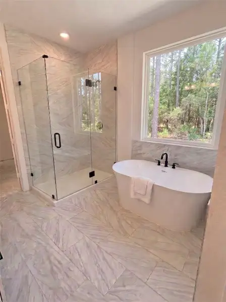 Furnished interior view inside a new home in Pine Rock South, Conroe (Image 3).