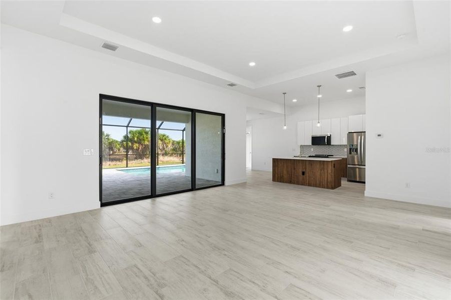 Spacious, unfurnished interior of a new home in , Port Charlotte (Image 33).
