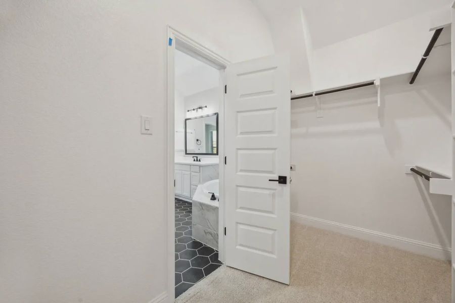 Representative furnished interior of a home built from the Caldwell by Chesmar Homes in Summer Crest, Crowley (Image 7).