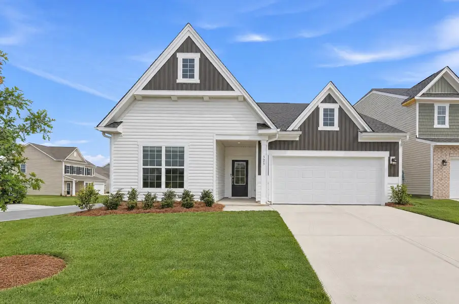 Front exterior of a new home in Pine Oaks Estates, Gilbert, SC, highlighting curb appeal (Image 1). Front exterior of a new home in Pine Oaks Estates, Gilbert, SC, highlighting curb appeal (Image 1).