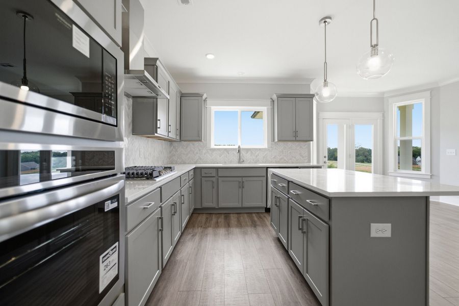 Furnished interior view inside a new home in Aden Woods, Fairview (Image 8).