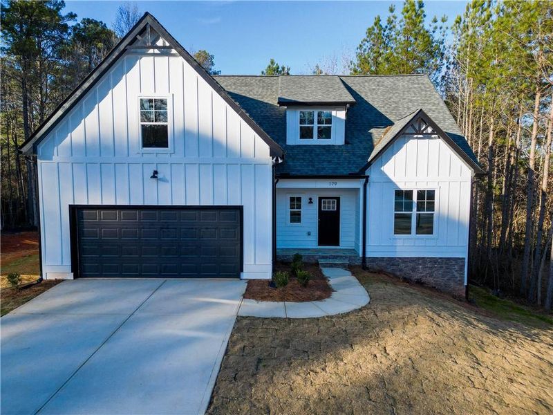 Front exterior of a new home in , Villa Rica, GA, highlighting curb appeal (Image 22).