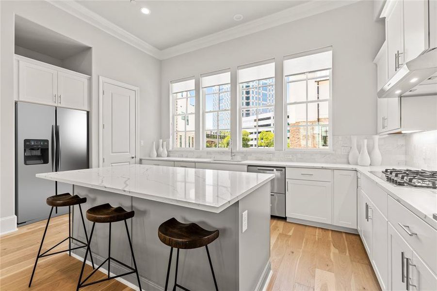 Image of model home with similar floorplan.