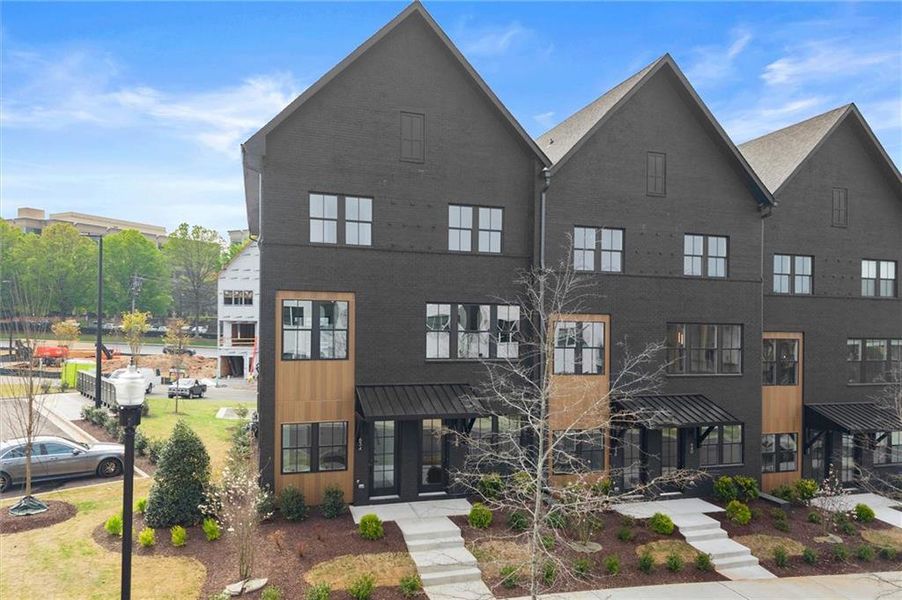 Front exterior of a new home in , Alpharetta, GA, highlighting curb appeal (Image 26). Front exterior of a new home in , Alpharetta, GA, highlighting curb appeal (Image 26).