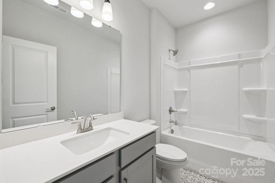 Furnished interior view inside a new home in Walk23, Huntersville (Image 7).