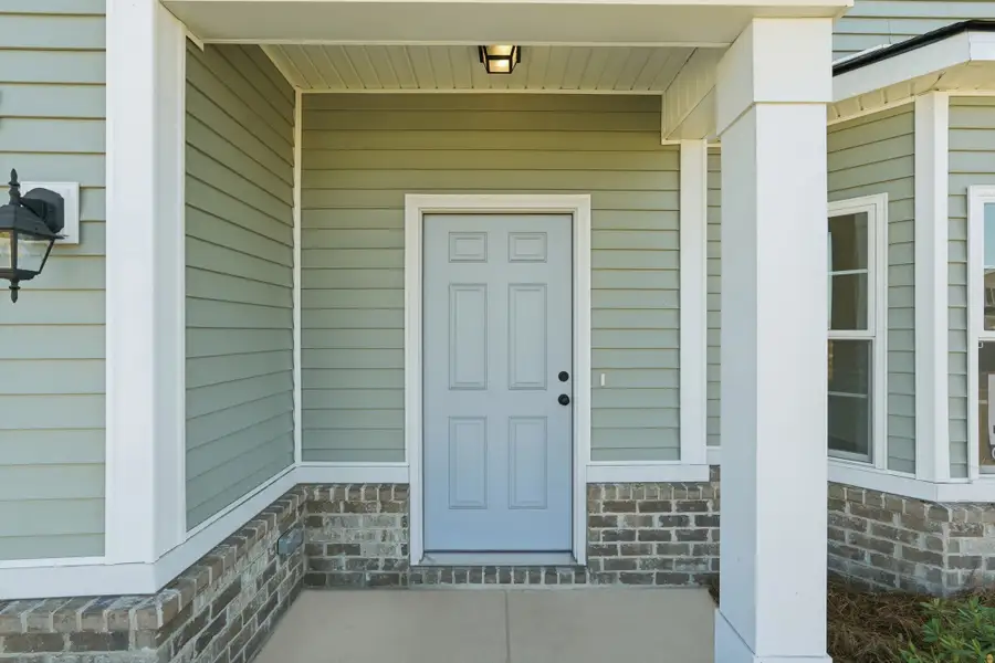 Representative exterior details of a home built from the The Chatman by RTS Homes in The Gardens at 15 West, Hinesville (Image 3).
