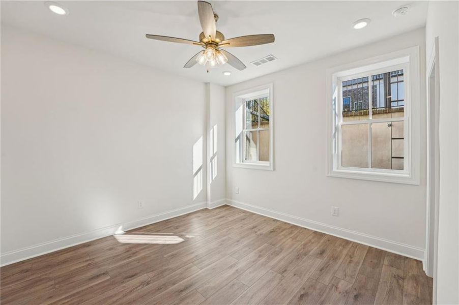 Spacious, unfurnished interior of a new home in Towns on Thompson, Alpharetta (Image 32).
