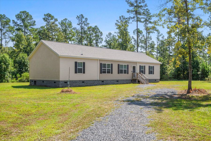 Front exterior of a new home in , Summerville, SC, highlighting curb appeal (Image 18).