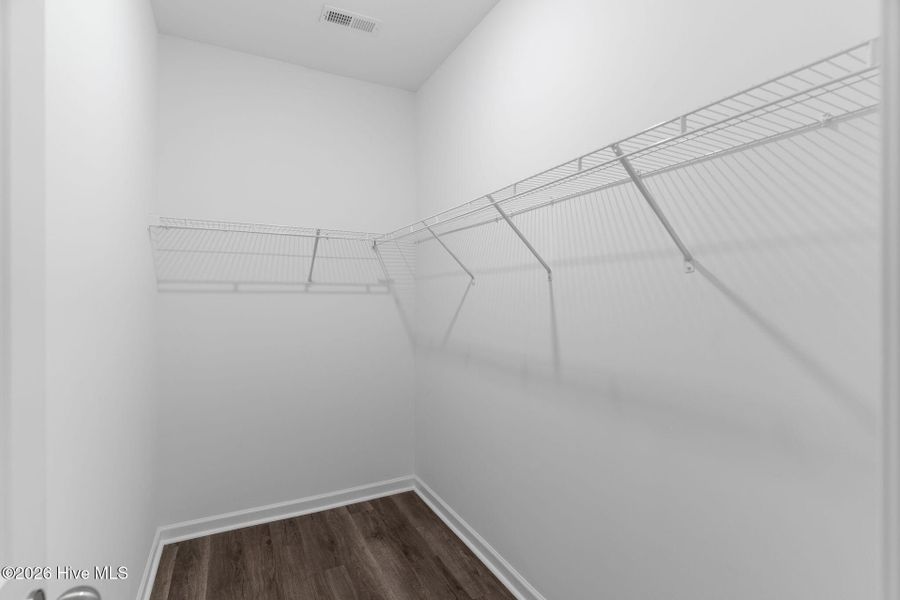 Spacious, unfurnished interior of a new home in Coastal Haven Townes, Leland (Image 26).