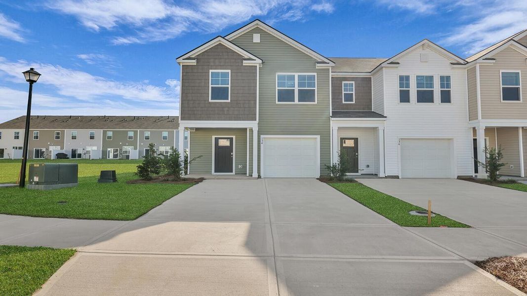 Exterior details and patio area of a home in Carolina Groves Townhomes, Moncks Corner (Image 3).