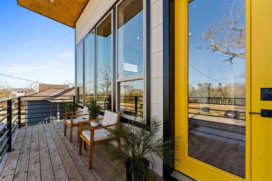 Both the front and rear balconies provide tranquil outdoor spaces with serene views.