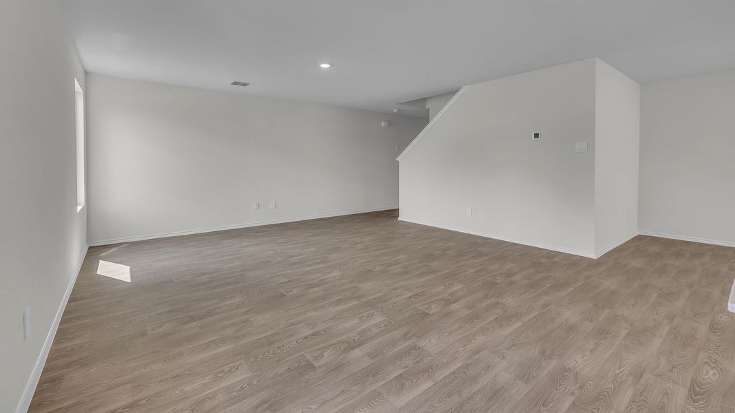Representative unfurnished interior of a home built from the The Franklin by D.R. Horton in Spring Valley, New Braunfels (Image 16).