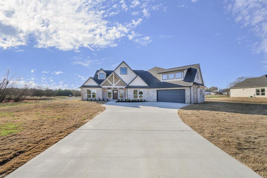 Front exterior of a new home in , Farmersville, TX, highlighting curb appeal (Image 24).