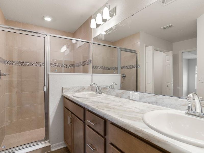 Your suite is complete with a private en-suite bath and two walk-in closets.