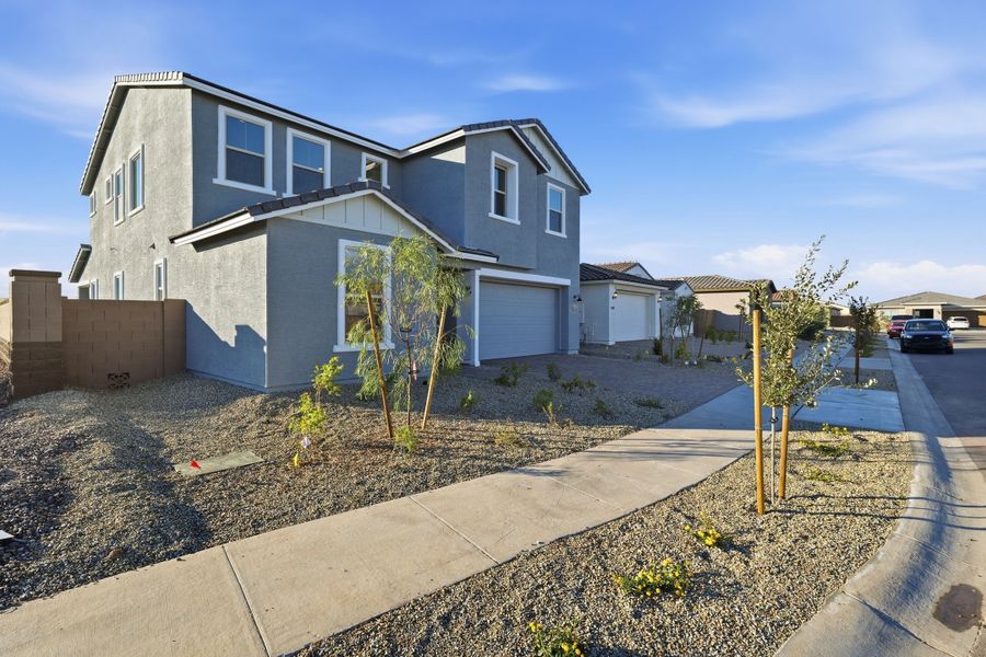 Representative exterior photo of a completed home built from the Triumph by Taylor Morrison in Artisan at Asante Encore Collection, Surprise, AZ (Image 20). Representative exterior photo of a completed home built from the Triumph by Taylor Morrison in Artisan at Asante Encore Collection, Surprise, AZ (Image 20).