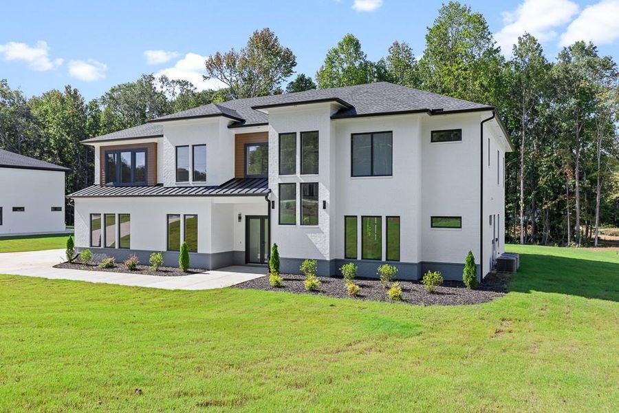Front exterior of a new home in , Jefferson, GA, highlighting curb appeal (Image 22).