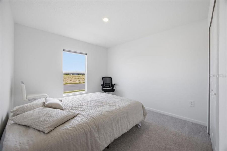 Furnished interior view inside a new home in Hunt Club Groves, Lake Wales (Image 19).