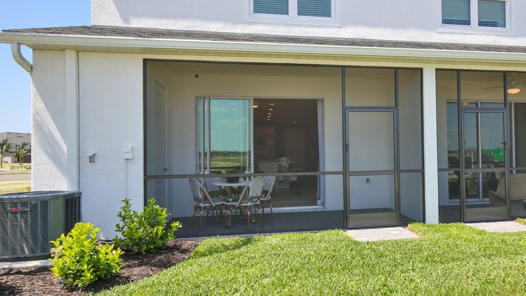 Exterior details and patio area of a home in Palm Grove Real Estate and Homes for Sale in Lakewood Ranch, FL - Neal Communities, Lakewood Ranch (Image 37).