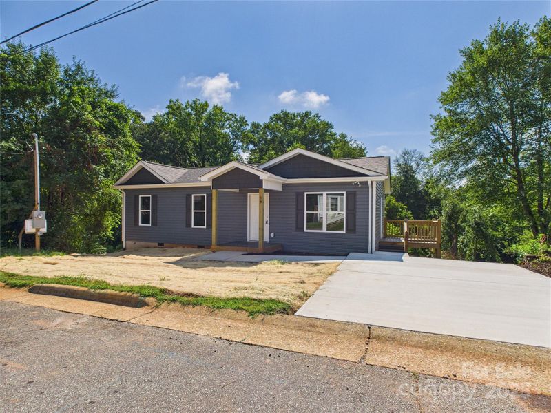 Front exterior of a new home in , Granite Falls, NC, highlighting curb appeal (Image 22).