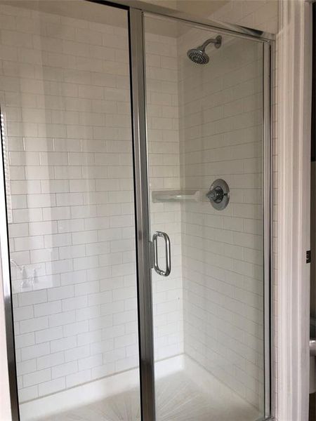 Bathroom with an enclosed shower