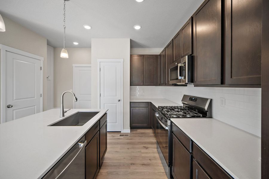 Furnished interior view inside a new home in Ridge at Lorson Ranch, Colorado Springs (Image 8).
