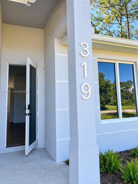 Exterior details and patio area of a home in , Lehigh Acres (Image 3).