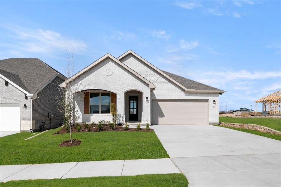 Front exterior of a new home in Country Hollow, Aledo, TX, highlighting curb appeal (Image 25). Front exterior of a new home in Country Hollow, Aledo, TX, highlighting curb appeal (Image 25).