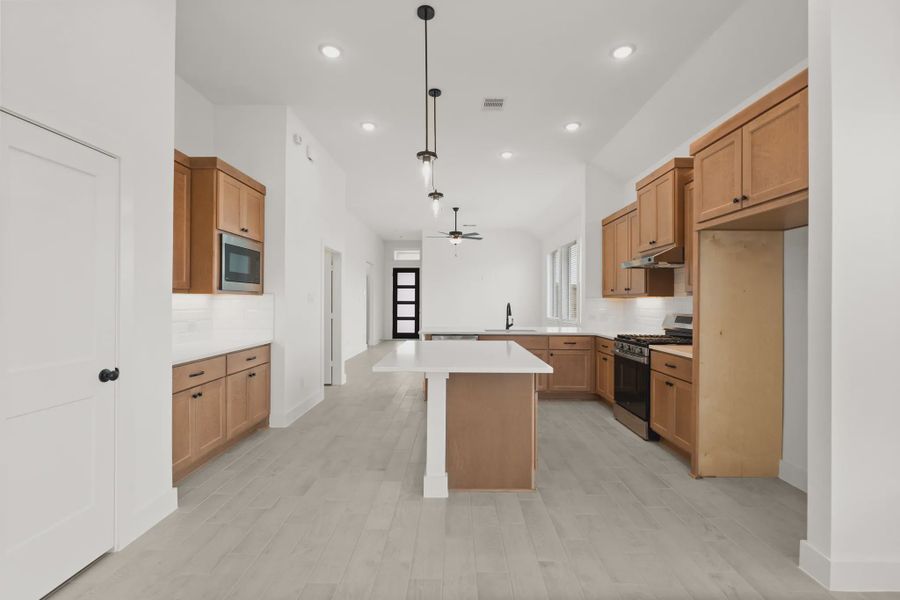 Representative furnished interior of a home built from the Pinehurst by Chesmar Homes in Riceland Alley Loads, Mont Belvieu (Image 6).