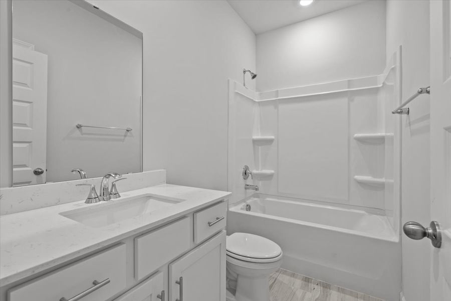 Furnished interior view inside a new home in The Farm at Wells Creek - Signature Collection, Gray Court (Image 4).