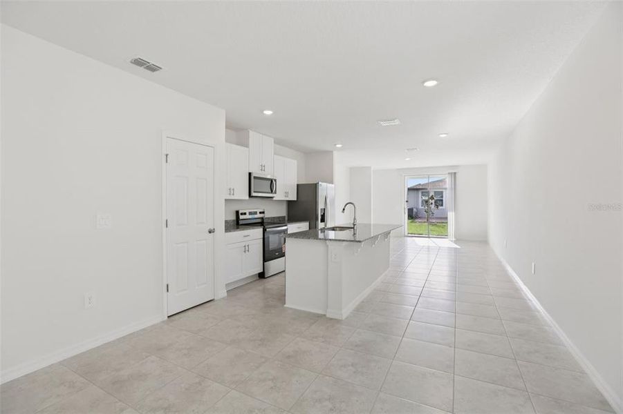 Furnished interior view inside a new home in Springs at Lake Alfred - Classic Series, Lake Alfred (Image 10).
