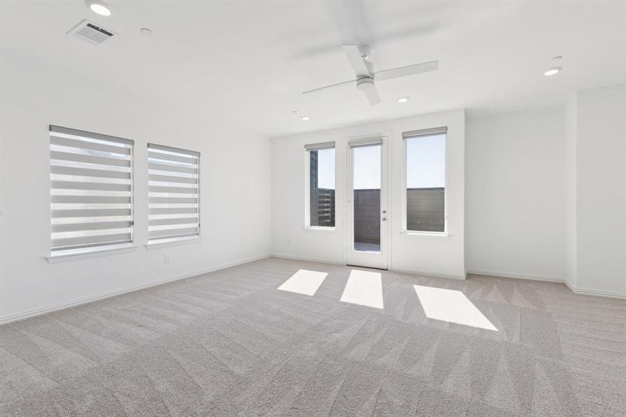 Unfurnished room featuring light colored carpet, recessed lighting, and ceiling fan Unfurnished room featuring light colored carpet, recessed lighting, and ceiling fan