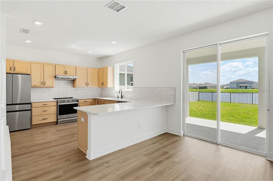 Furnished interior view inside a new home in , Parrish (Image 9).