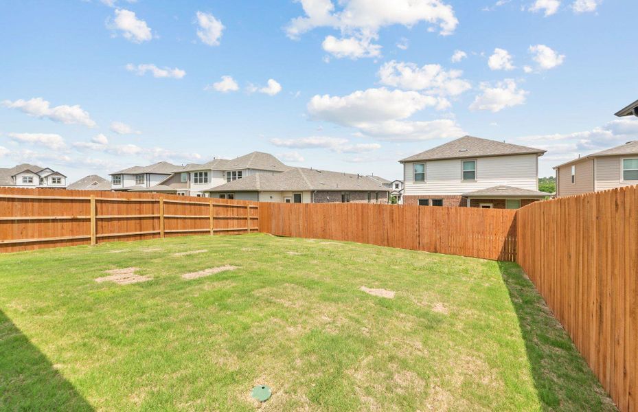 Exterior details and patio area of a home in Saddleback at Santa Rita Ranch, Liberty Hill (Image 2).
