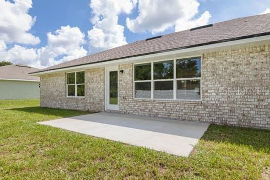 Exterior details and patio area of a home in Palm Coast, Palm Coast (Image 3).