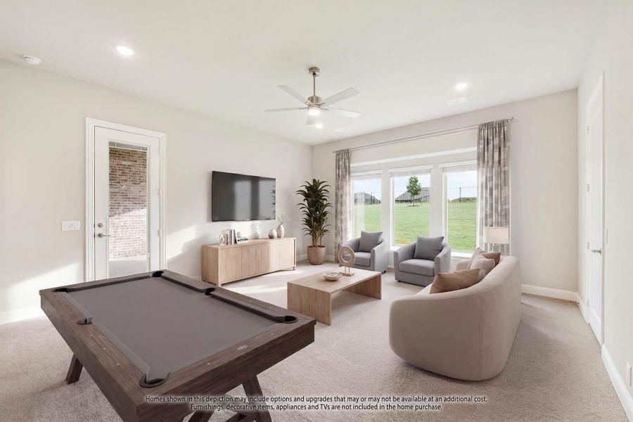 Game room with pool table, seating area, wall-mounted TV, and large windows overlooking backyard