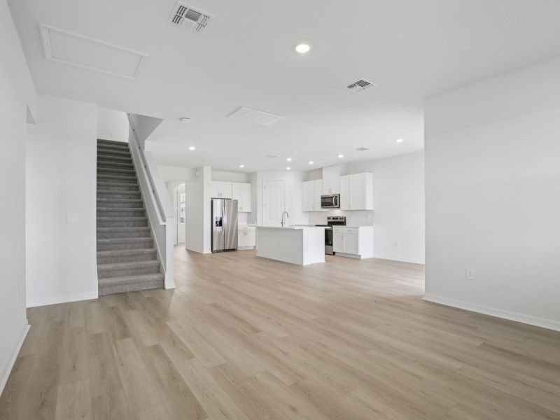Spacious, unfurnished interior of a new home in Coasterra - Reserve Series, Palmetto (Image 9).